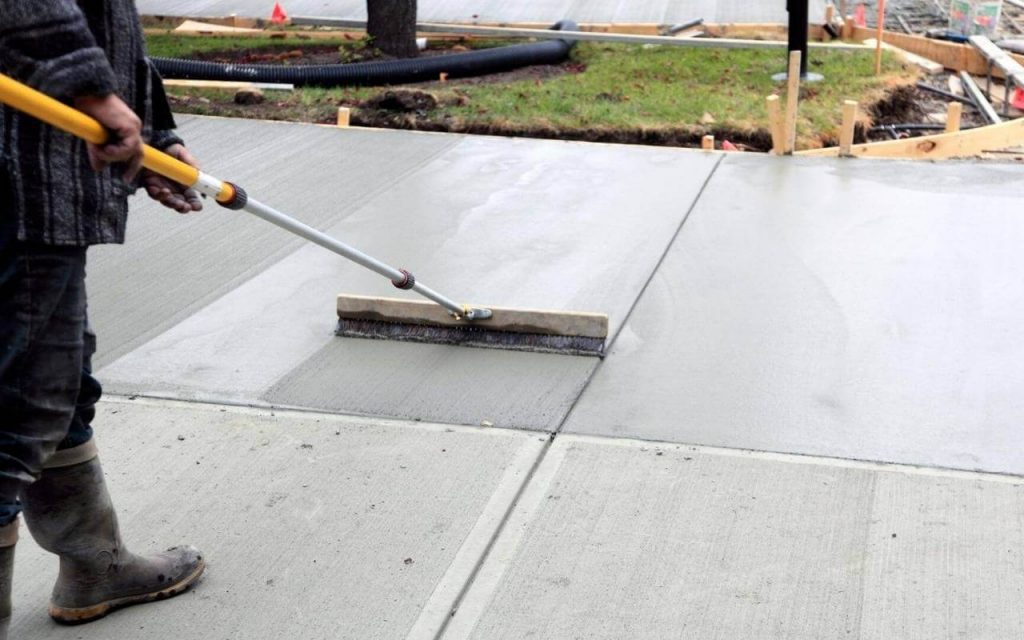 FLLA Concrete Contractor Lehigh Acres's Staff working on a Concrete Driveway project in Lehigh Acres FL